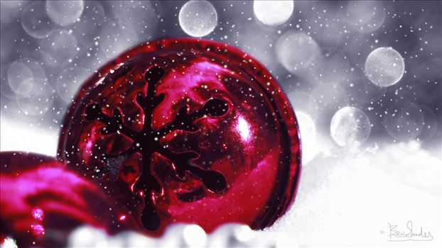 Fuschia Christmas Balls in the snow with bokeh background
